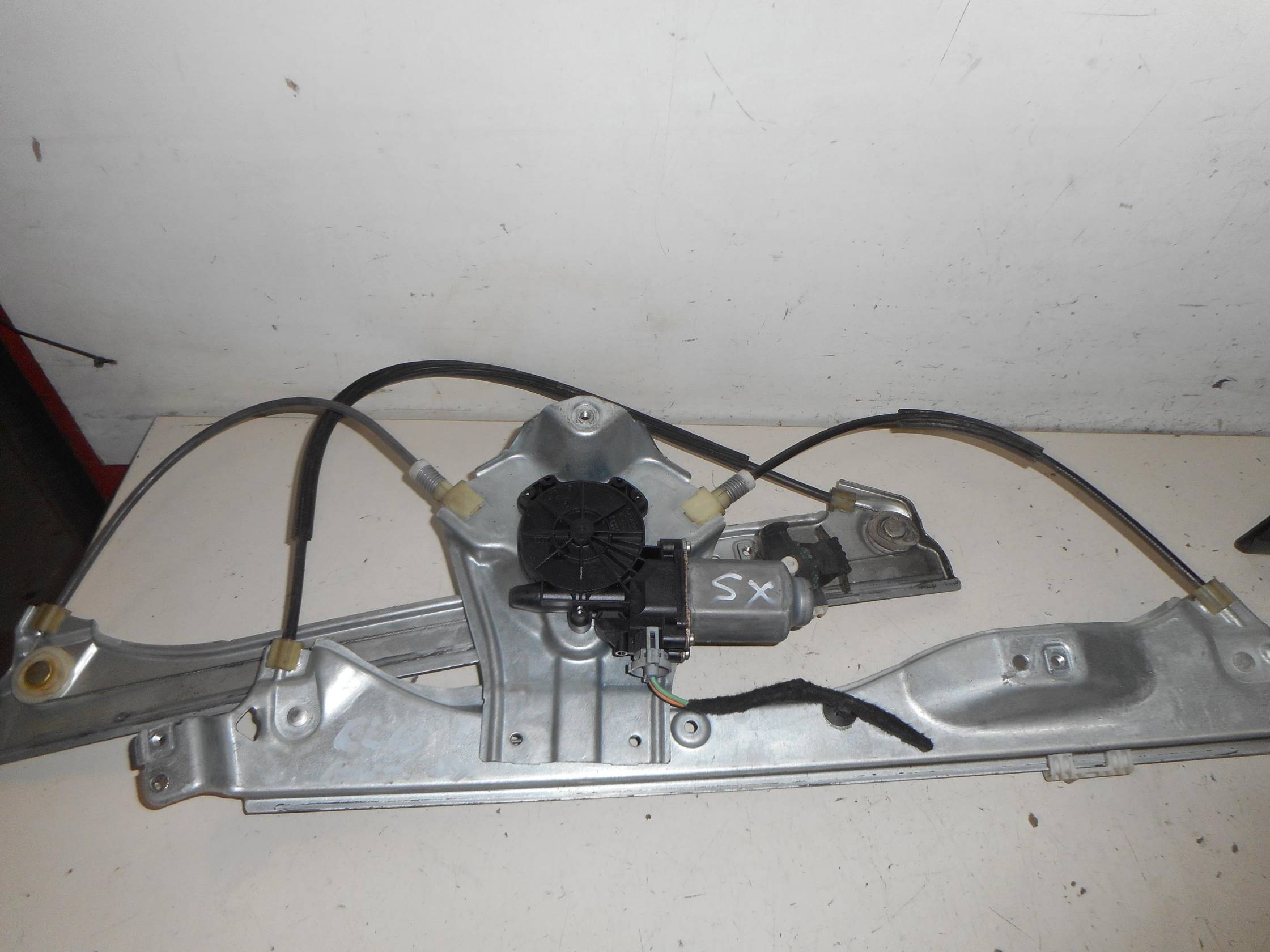 Alzacristallo elettr. porta ant. sx.